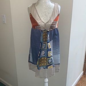 Reacollection 100% silk tunic dress. Bright colors and contrasting patterns.